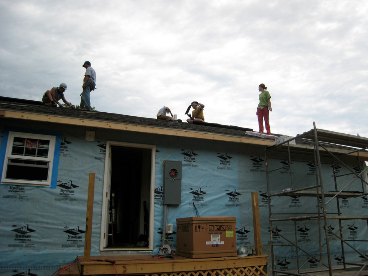 roofers on a roof in kansas city